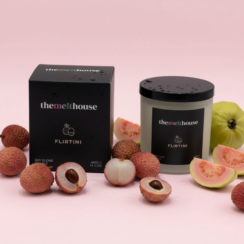 Flirtini The Melt House candle with lychees and guava on a pink background