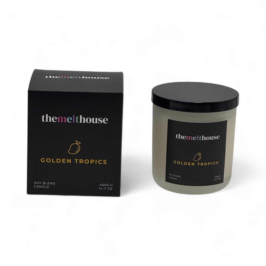 The Melthouse Golden Tropics candle and packaging on a white background
